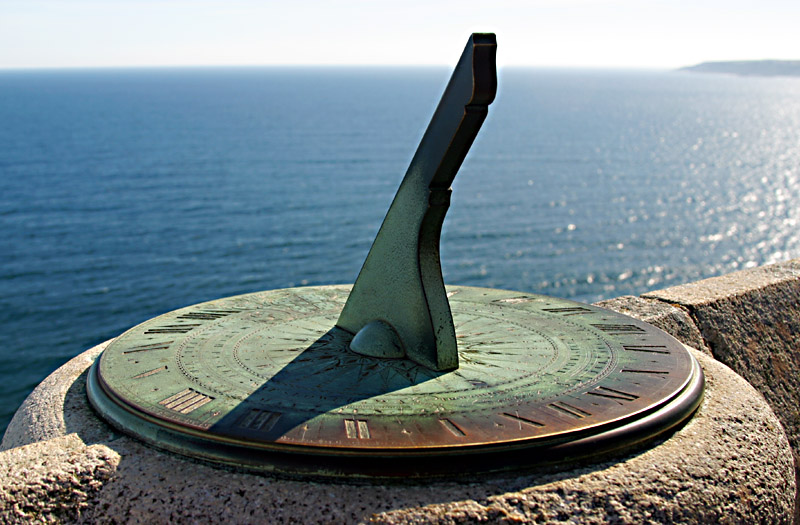 Sundial overlooking the water