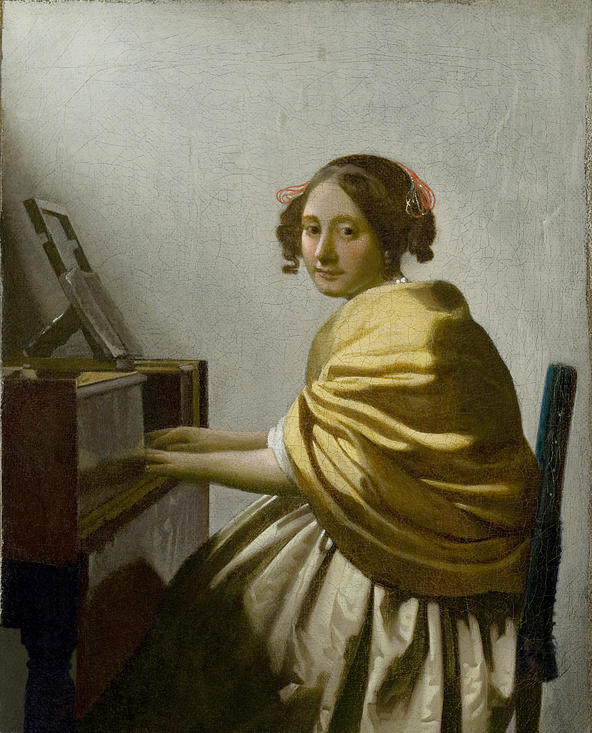 A Young Woman Seated at a Virginal, c. 1670-72